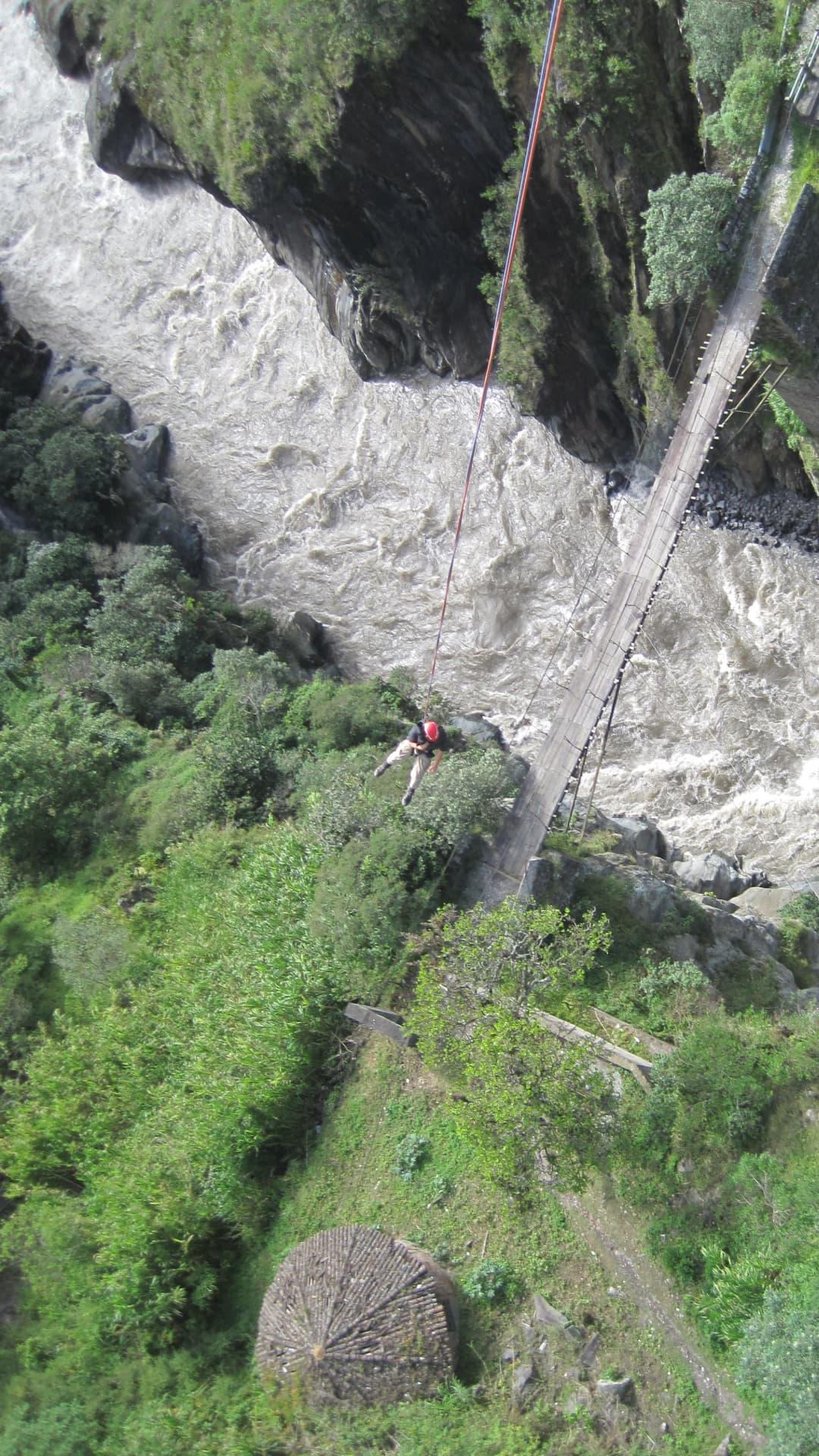Waterfall descent during canyoning in Mindo Ecuador