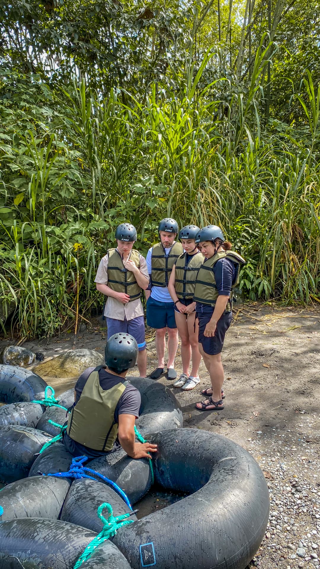 Friends tubing together on the Mindo River