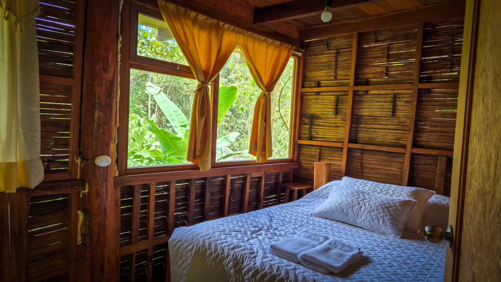 Rustic cabin room at Roca Mía near Mindo Ecuador